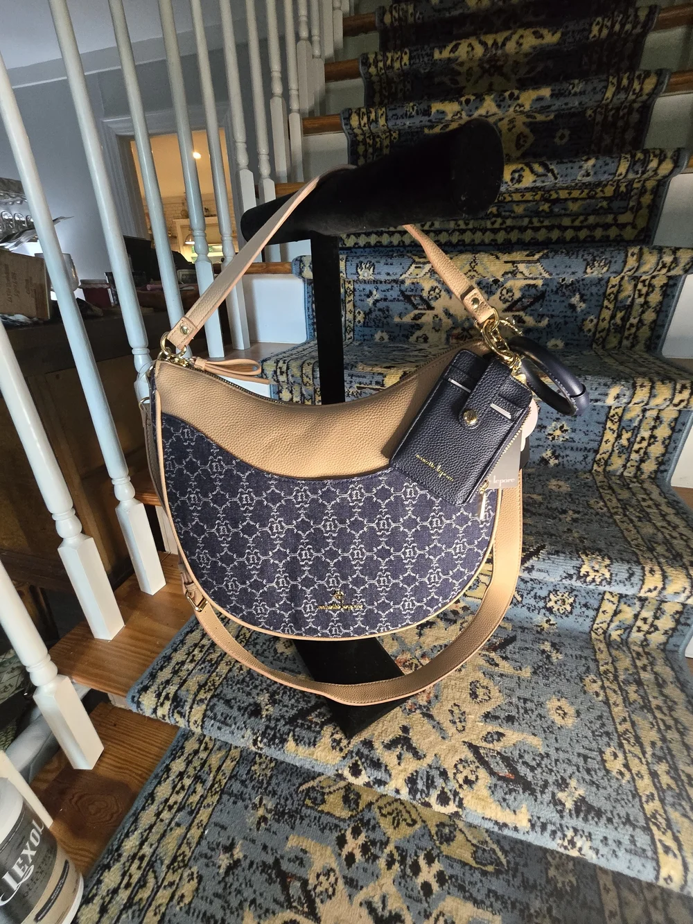 Nanette Lepore Blue and Tan Crescent Shoulder Bag with Monogram Pattern